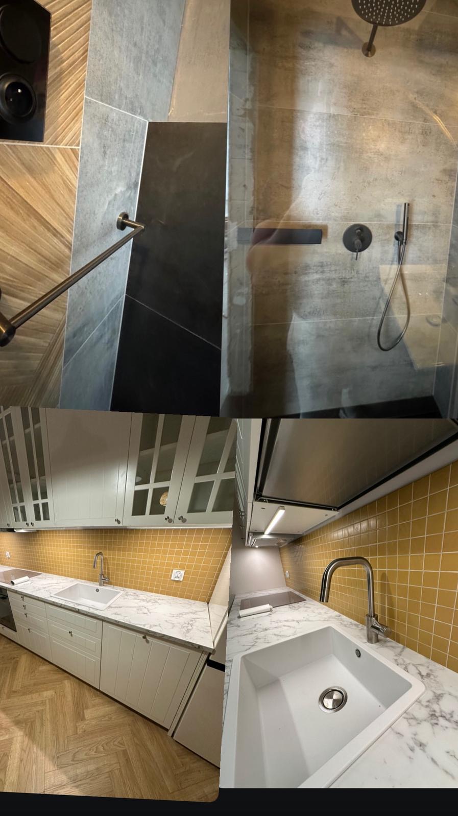Nowoczesna łazienka z kabiną prysznicową typu walk-in, wykończona w szarościach i czerni, oraz kuchnia z białymi szafkami i żółtą mozaiką na ścianie.