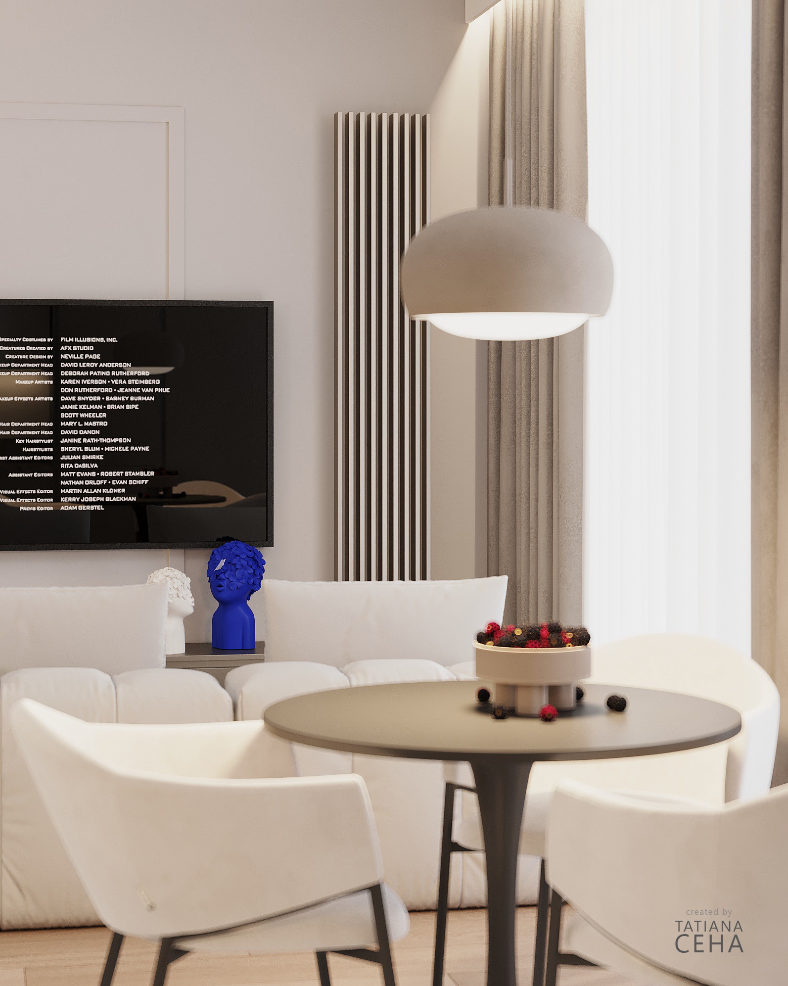 Eleganckie wnętrze: biała sofa z dekoracyjnymi figurkami, okrągły stół z owocami i minimalistyczna lampa wisząca. Nowoczesny design z akcentami kolorystycznymi.