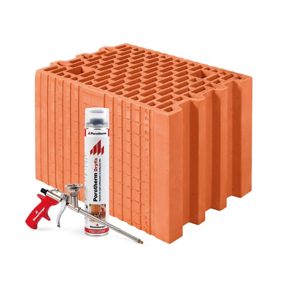 Pustak ceramiczny Porotherm 25 Dryfix na piance, z widoczną puszką pianki montażowej i aplikatorem. Prezentacja materiałów budowlanych.