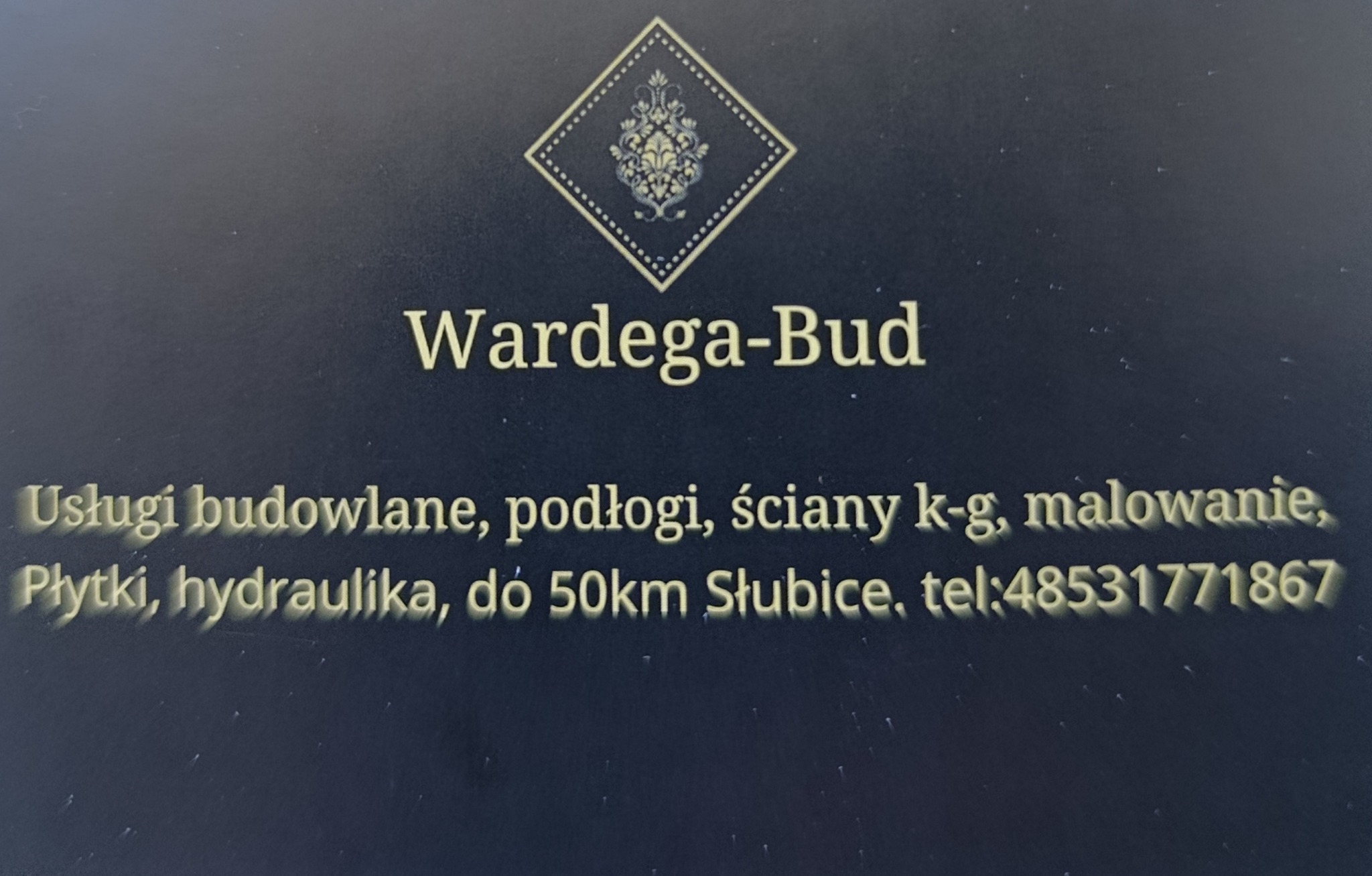 Wizytówka firmy Wardega-Bud z Słubic, oferującej usługi budowlane, podłogi, ściany k-g, malowanie, płytki, hydraulika w promieniu 50km. Kontakt: 48531771867.