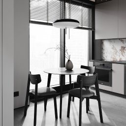 TARBAEV ARCHITECTS Eugeniusz Tarbayev - Nowoczesna kuchnia z okrągłym stołem, czterema krzesłami i marmurowym blatem. Minimalistyczny design, stonowana kolorystyka, duże okno z żaluzjami.