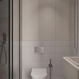 TARBAEV ARCHITECTS Eugeniusz Tarbayev - Minimalistyczna łazienka w szarościach: kabina prysznicowa z czarną ramą, podwieszana toaleta, umywalka z szafką i płytki imitujące cegłę. Nowoczesny design.