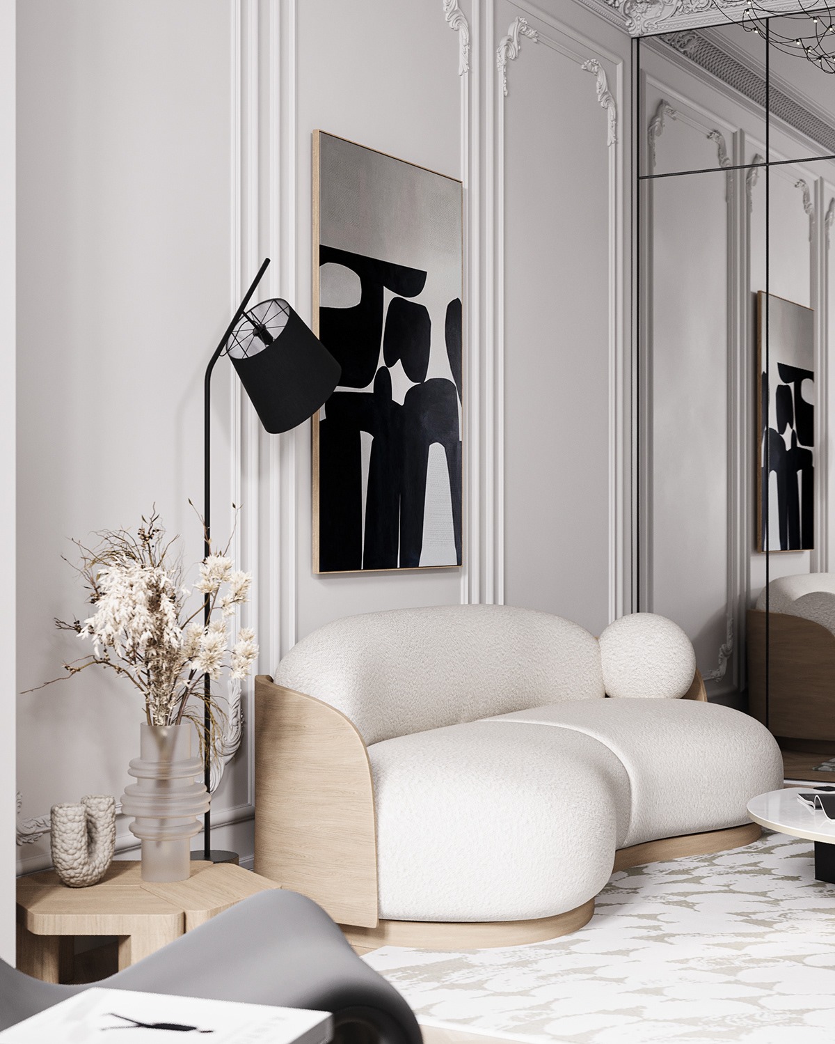 Elegancki salon: biała sofa o obłych kształtach, abstrakcyjny obraz w czerni i bieli, designerska lampa i lustrzane panele na ścianie, tworzące nowoczesną, minimalistyczną przestrzeń.