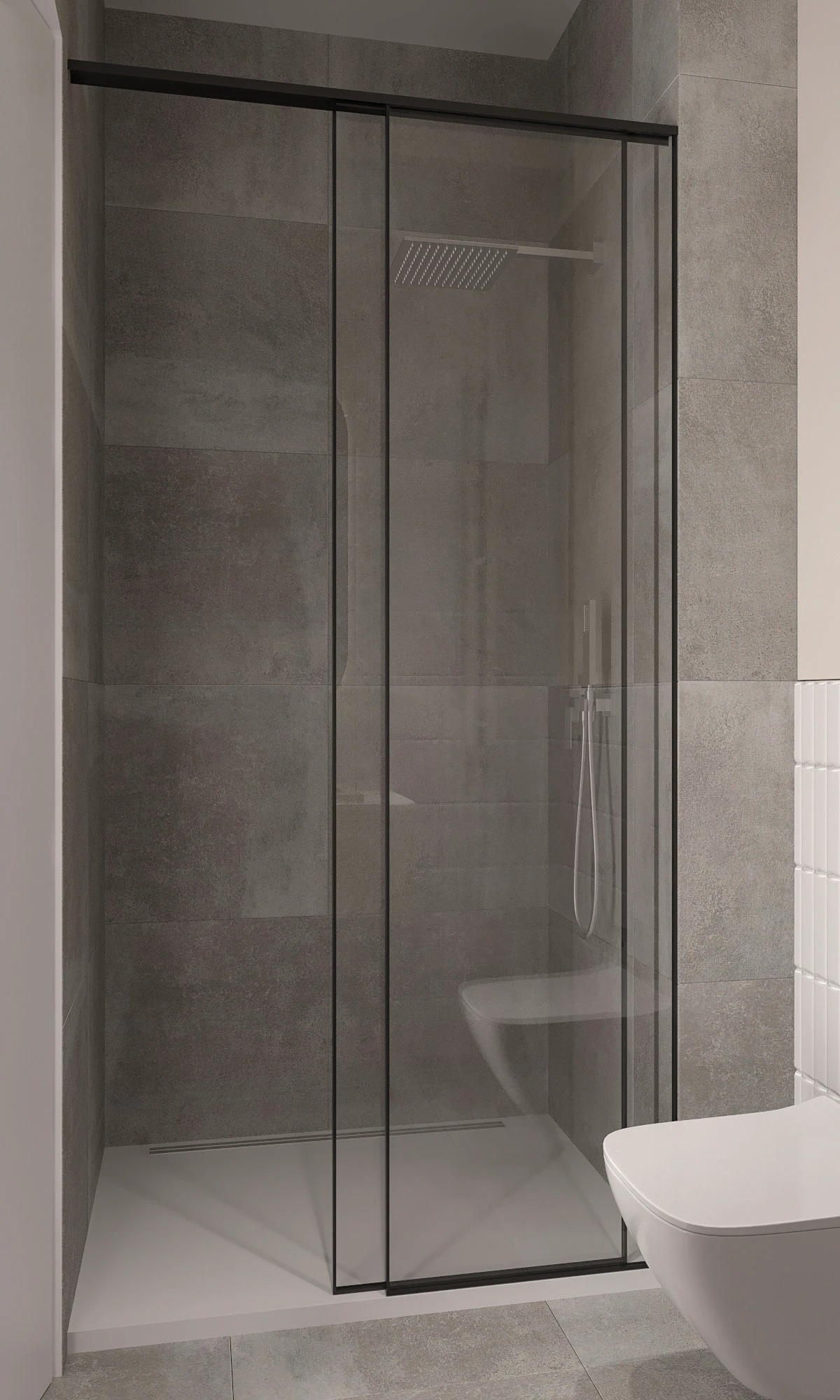 Nowoczesna kabina prysznicowa z czarnymi ramami i deszczownicą, szare płytki na ścianach, toaleta w minimalistycznym stylu. Widok na łazienkę z bliska.