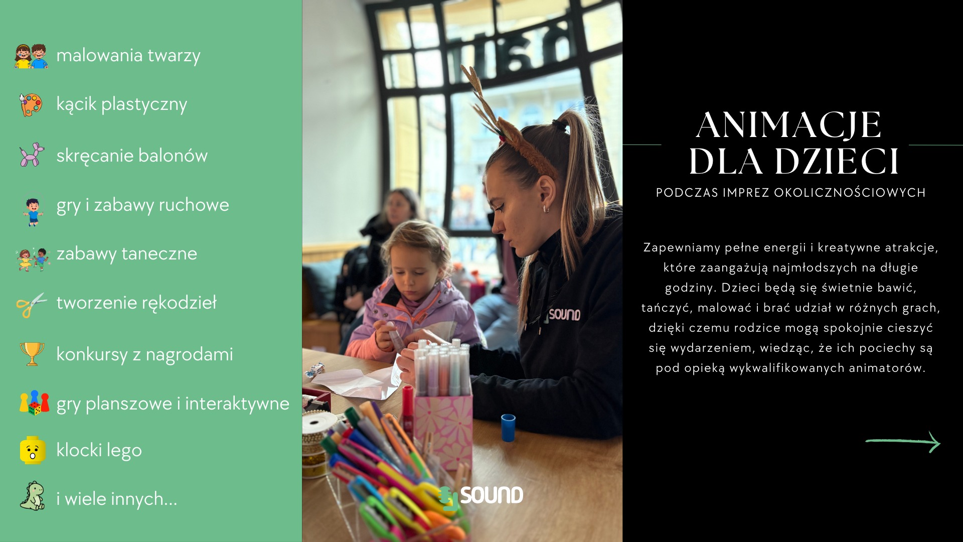 Animator z dzieckiem tworzą rękodzieło podczas imprezy okolicznościowej. Kolorowe pisaki i materiały plastyczne na stole. W tle okno i inne osoby.