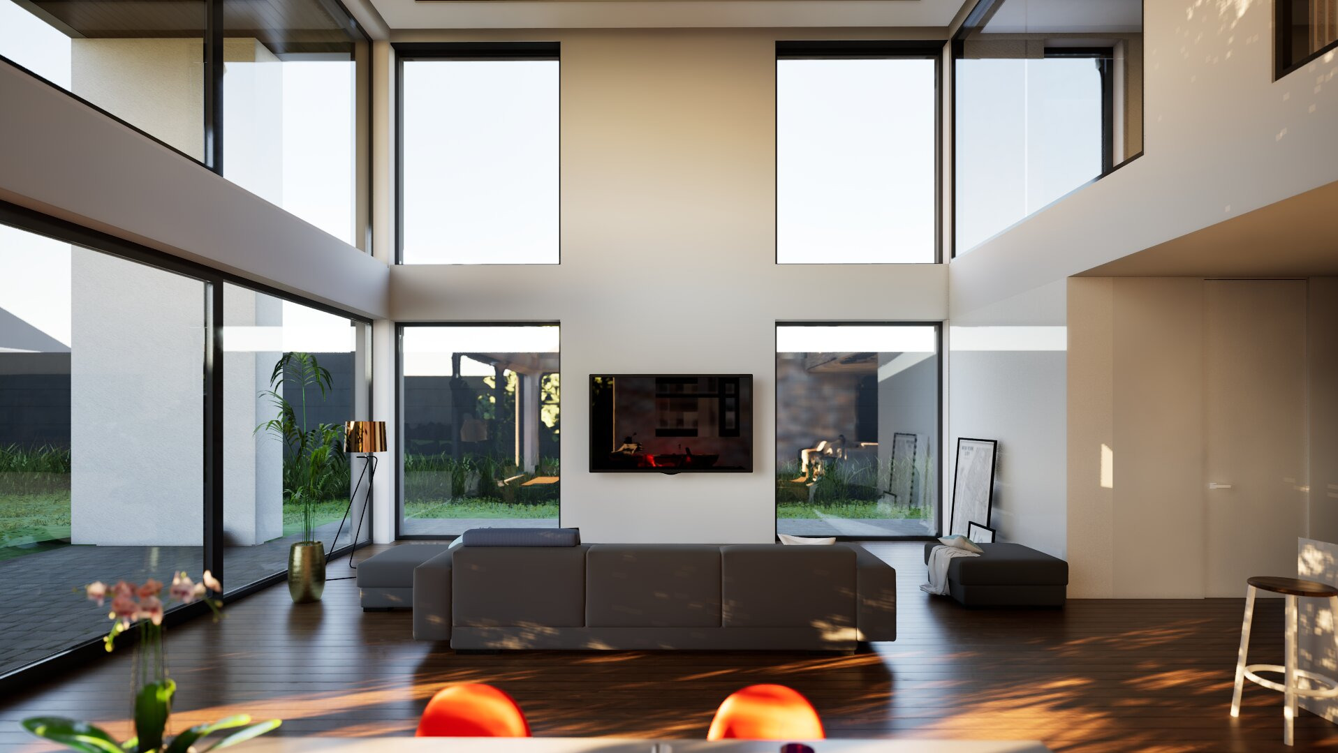 Nowoczesny salon z dużymi oknami, szarą sofą i drewnianą podłogą. Minimalistyczny design z widokiem na zieleń za oknem. Jasne wnętrze z elementami dekoracyjnymi.
