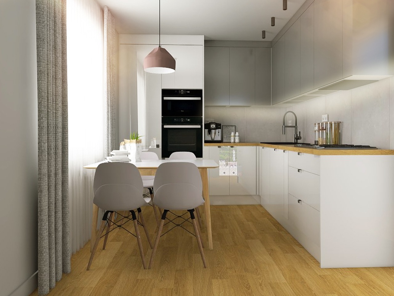Jasna kuchnia z drewnianą podłogą i białymi meblami, oświetlona naturalnym światłem. Stół z krzesłami w minimalistycznym stylu. Widoczne AGD i elementy dekoracyjne.