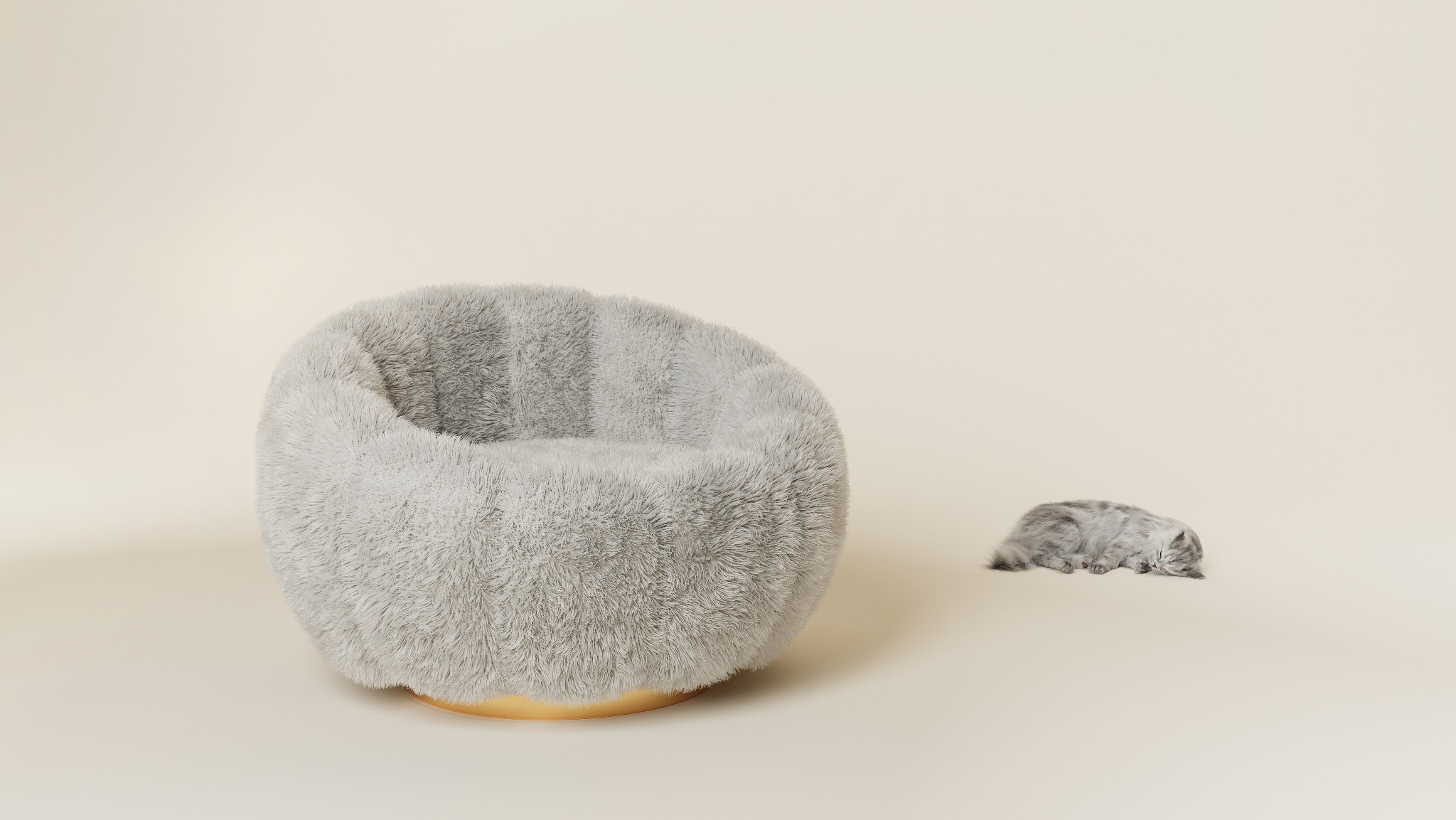 Puszysty, szary fotel typu 'bean bag' na złotej podstawie, obok śpiący szary kot na beżowym tle. Minimalistyczny design, miękkie tekstury.