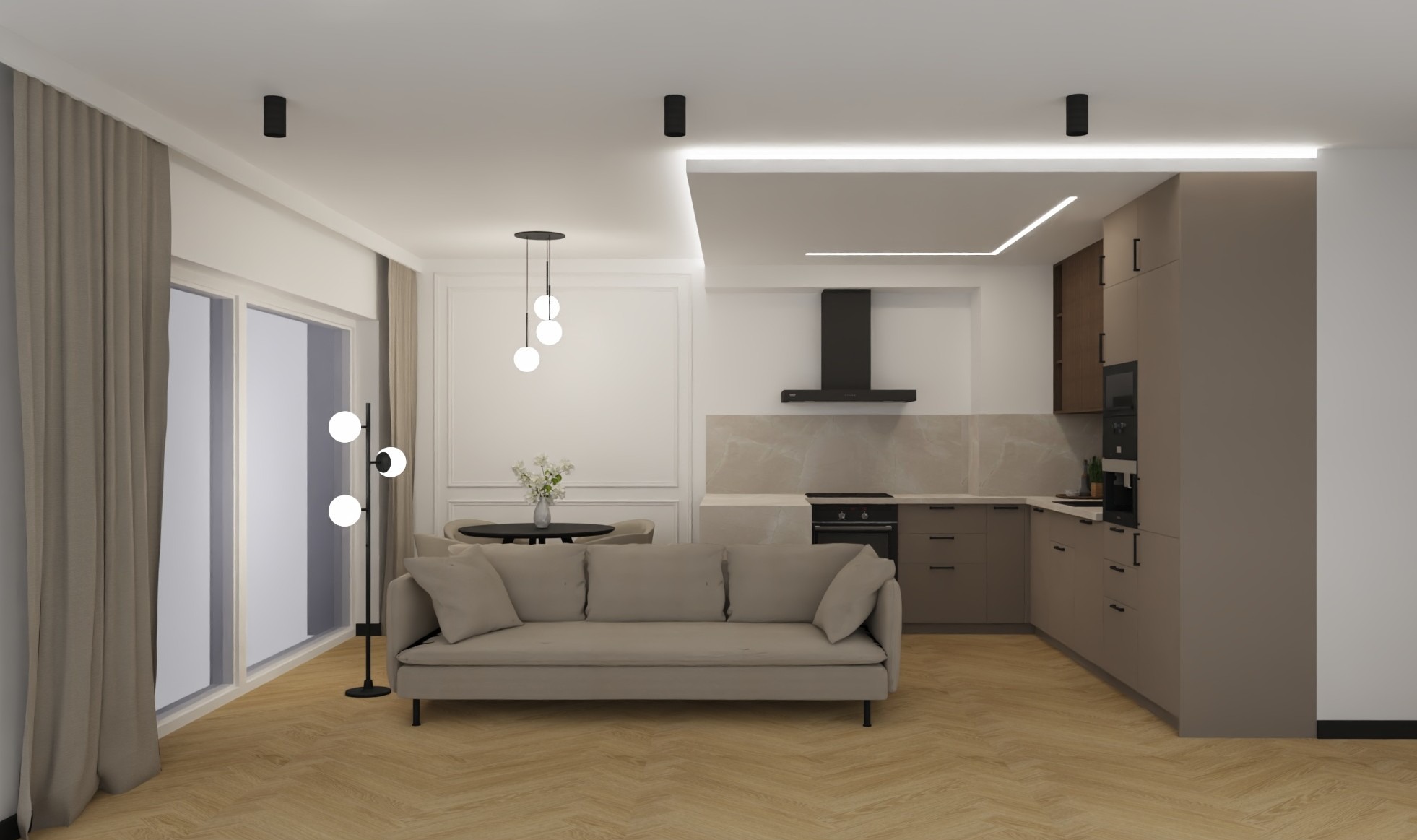 Stylowa aranżacja wnętrza z kuchnią i salonem w Radomicach. Widoczne meble kuchenne w zabudowie, sofa i stół. Całość utrzymana w stonowanej kolorystyce.