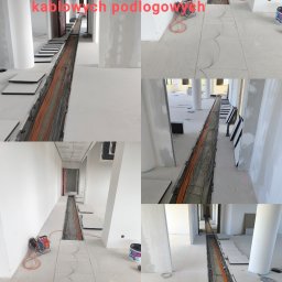 ENCEL ELECTRO SPÓŁKA Z OGRANICZONĄ ODPOWIEDZIALNOŚCIĄ - Kable ułożone w podłogowych trasach kablowych w długim korytarzu, z częściowo zamontowanymi płytami podłogowymi. Widoczne narzędzia i materiały budowlane.