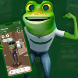 Grafika 3D żaby z aplikacją 'Herbatnik' na smartfonie, w kolorystyce zieleni, na tle zielonego gradientu. Projekt reklamowy dla klienta z Mierzyna.