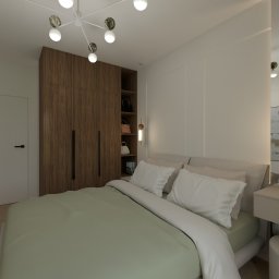 KRU Interiors - Nowoczesna sypialnia z łóżkiem w pistacjowej pościeli, drewnianą szafą i toaletką z dekoracjami. Lampy sufitowe w stylu art deco.