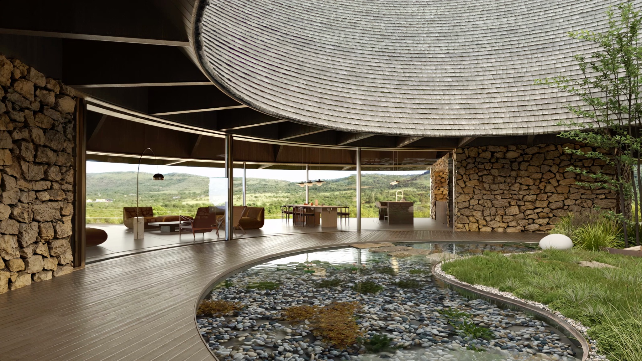 Nowoczesny dom z kamiennymi ścianami i okrągłym, drewnianym dachem w Rybniku. Wnętrze z widokiem na góry, ozdobny zbiornik wodny z kamieniami.