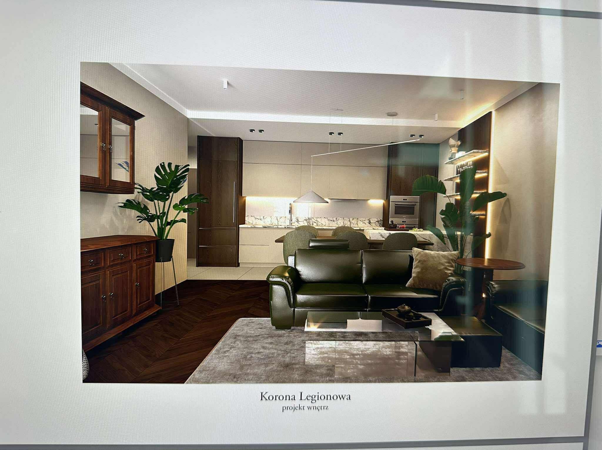 Eleganckie wnętrze: salon z kuchnią w stylu klasycznym. Ciemne drewno, zielona sofa, marmurowy blat. Projekt wnętrza z dbałością o detale i rośliny.