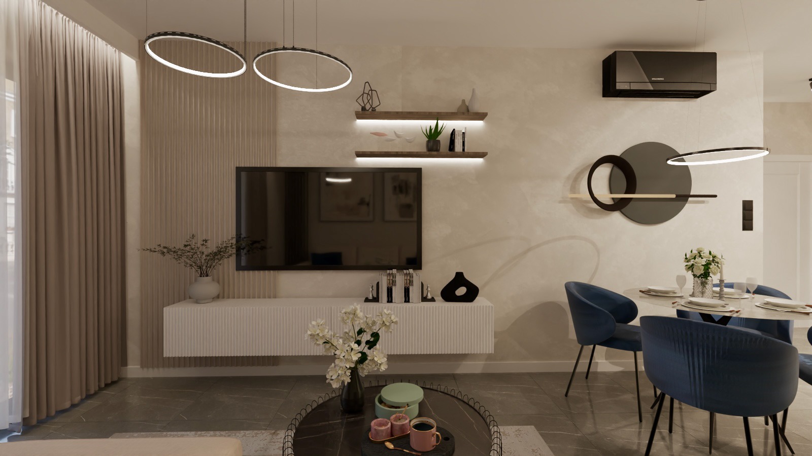 Elegancki salon z TV, niską szafką RTV, okrągłymi lampami i dekoracjami ściennymi. Stół jadalny z niebieskimi krzesłami. Minimalistyczny design, stonowana kolorystyka.