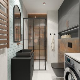 Corners Pracownia Paweł Szustakowski - Nowoczesna łazienka z kabiną prysznicową typu walk-in, umywalką nablatową i pralką. Uwagę przyciągają płytki imitujące rdzę i armatura w kolorze miedzi.