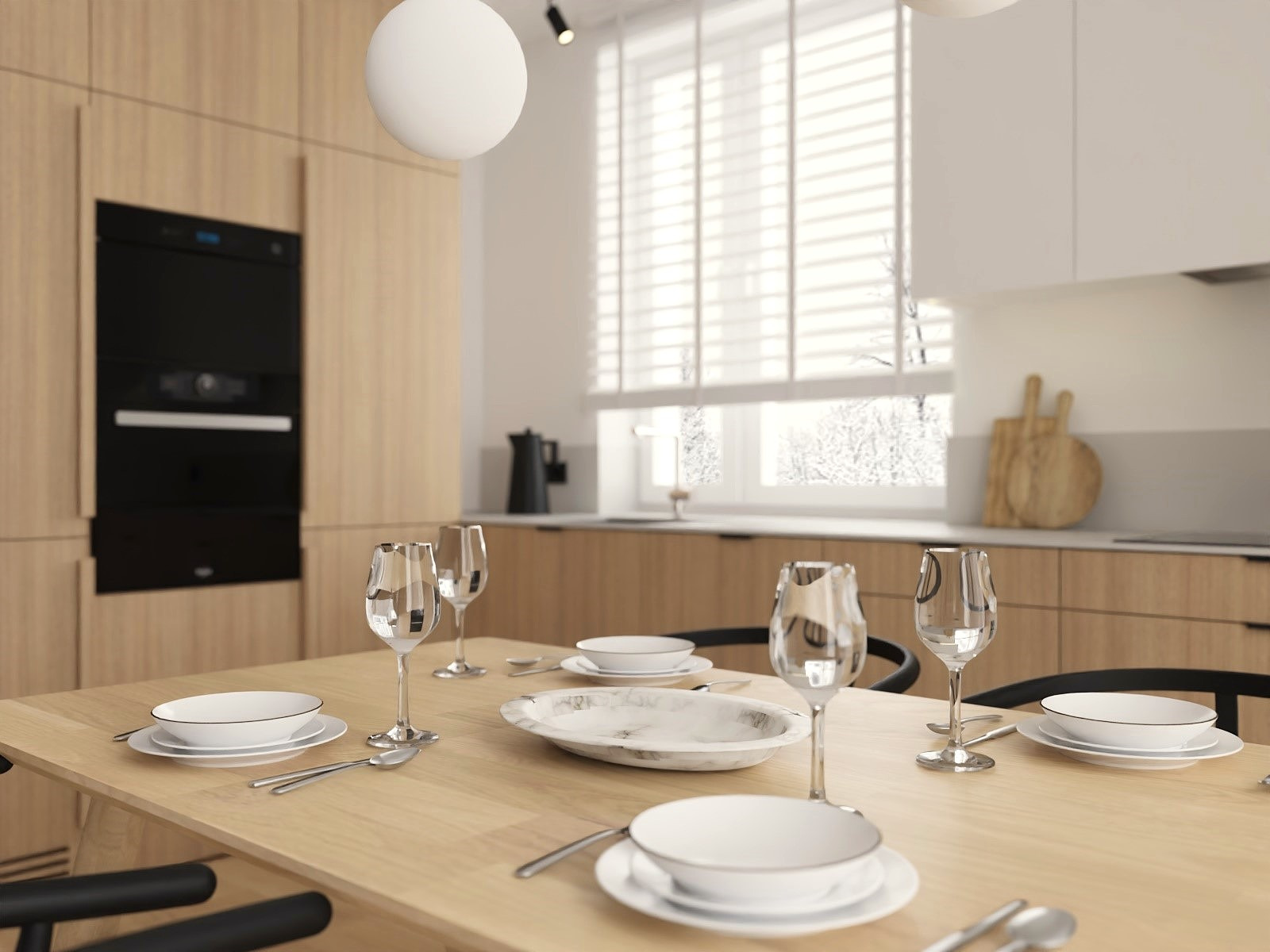 Jasna jadalnia z drewnianymi szafkami i czarnym piekarnikiem. Stół nakryty białą zastawą i kieliszkami. Za oknem zimowy krajobraz. Minimalistyczny design.