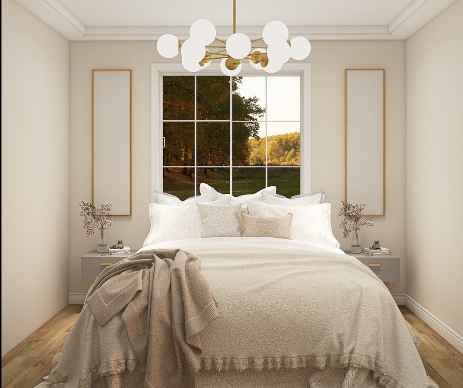 Jasna sypialnia z widokiem na jesienny krajobraz przez okno. Beżowa narzuta na łóżku, złote ramy dekoracyjne na ścianach, drewniana podłoga i nowoczesna lampa.