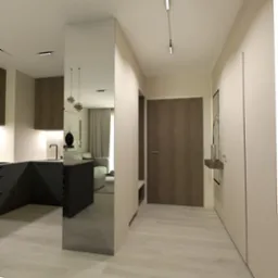 Wnętrze mieszkania z widokiem na kuchnię, salon i przedpokój. Minimalistyczny design, jasne kolory, drewniane akcenty. Nowoczesne oświetlenie.