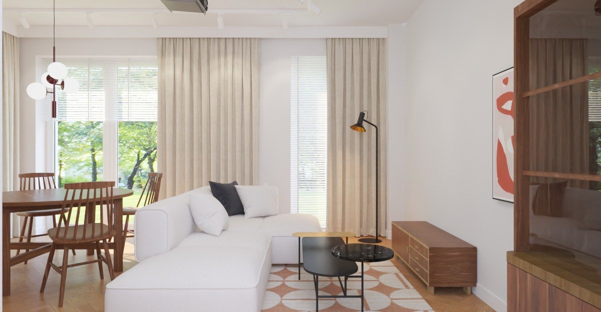 Jasne wnętrze salonu z białym narożnikiem, drewnianym stołem i krzesłami. Okno z widokiem na zieleń, designerska lampa podłogowa i abstrakcyjny obraz na ścianie.