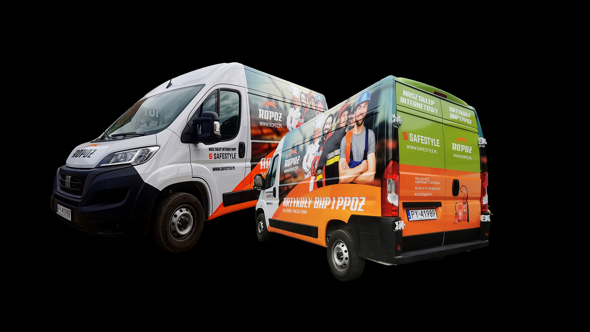 Dwa samochody dostawcze z oklejeniem reklamowym firm Safestyle i Ropoz, prezentujące artykuły BHP i PPOŻ. Jeden biały, drugi w kolorach pomarańczowym i zielonym.