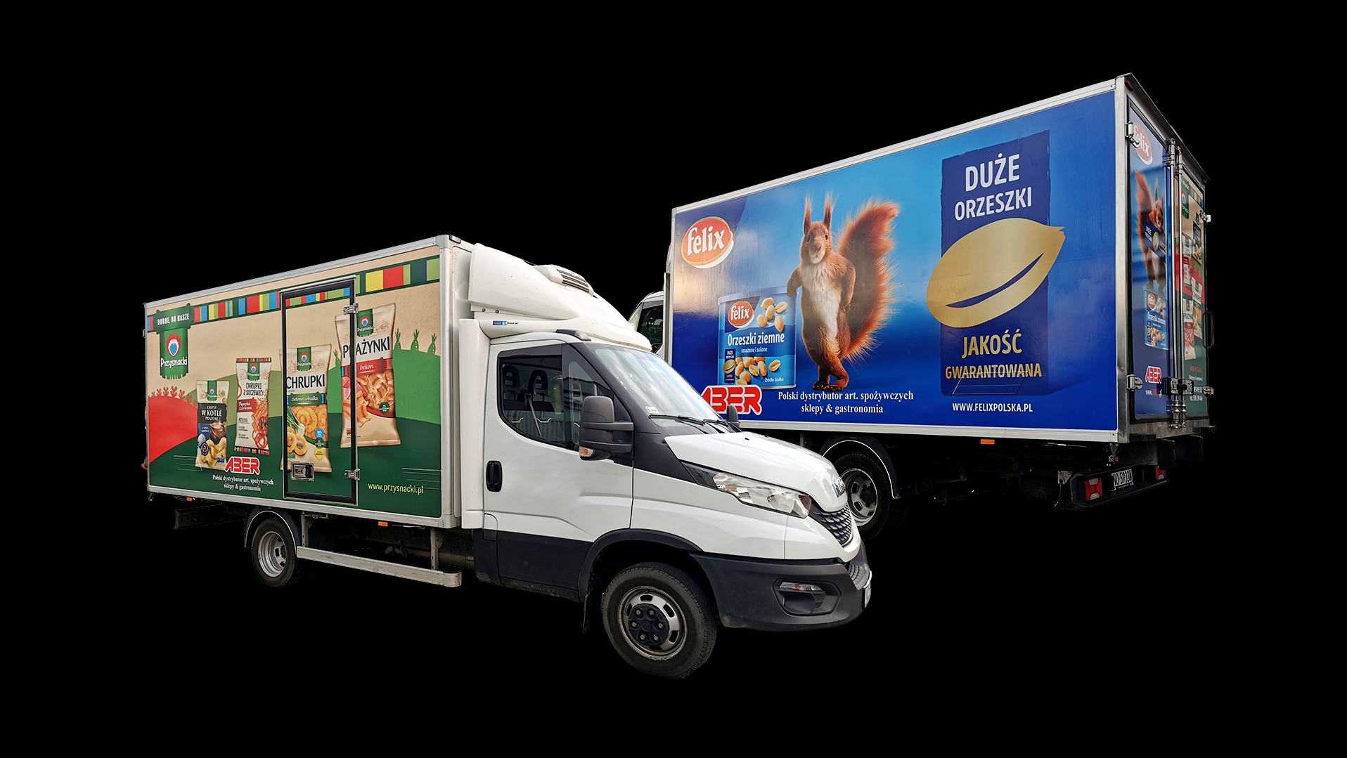 Dwa samochody dostawcze z reklamami produktów spożywczych marek Felix i Przysnacki, prezentujące branding i identyfikację wizualną firm na pojazdach.