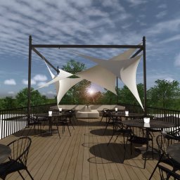 Jakubek Architekci - Wizualizacja tarasu z drewnianą podłogą, czarnymi meblami i białym zadaszeniem żaglowym. W tle zieleń drzew i błękitne niebo z chmurami. Słoneczny dzień.