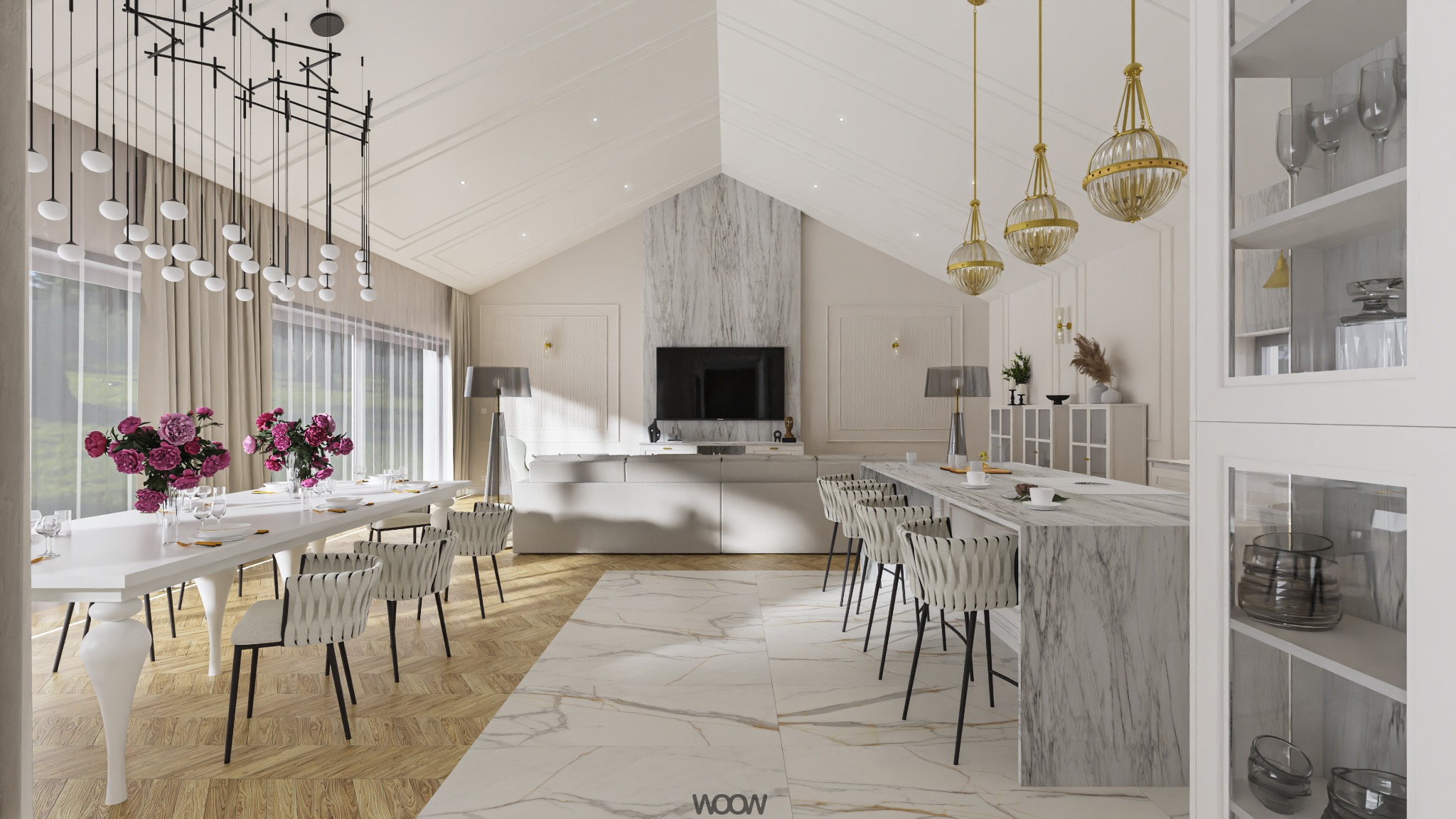 Eleganckie wnętrze: jasny salon z marmurową wyspą kuchenną, długi stół z kwiatami i nowoczesne oświetlenie. W tle sofa i telewizor.