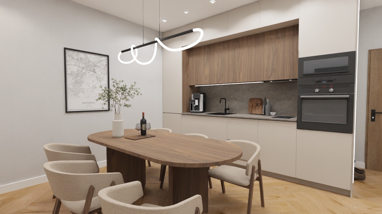 Nowoczesna kuchnia z drewnianymi akcentami: zabudowa kuchenna, drewniany stół z krzesłami, minimalistyczna lampa i mapa Katowic na ścianie. Jasne, przestronne wnętrze.