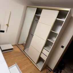 Damian Piekarski - Zlecenie 03.2026 - realizacja złożenia szafy łóżka oraz szafek wiszących