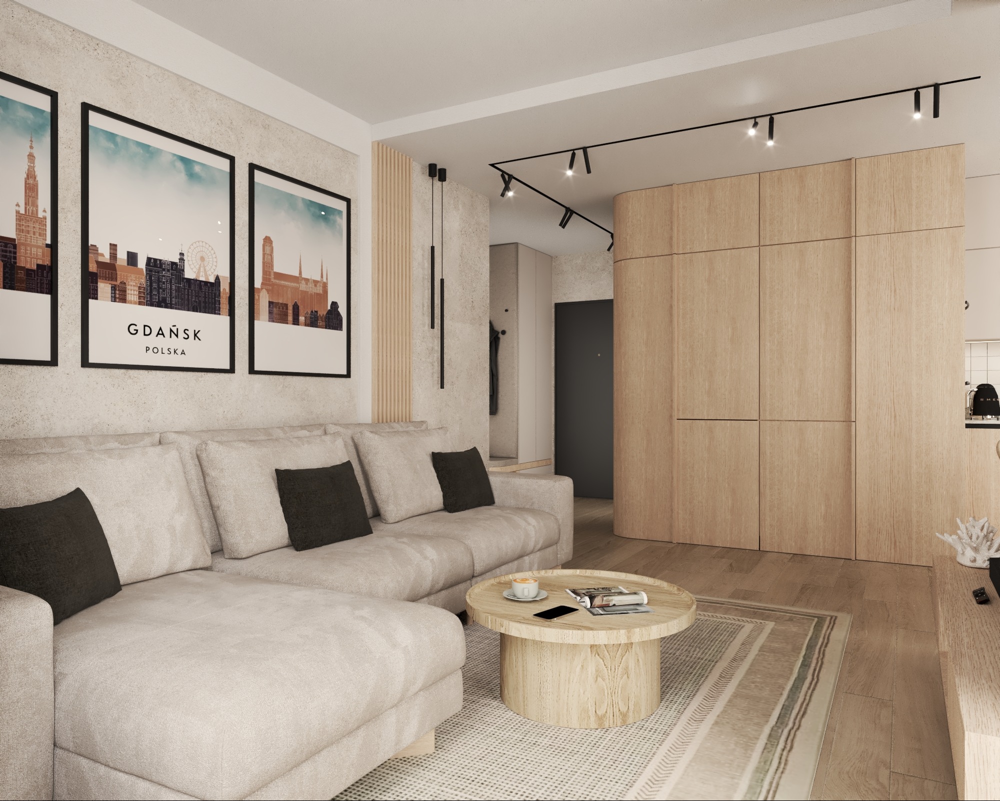 Jasny salon z plakatem Gdańska, beżową sofą narożną i okrągłym stolikiem kawowym. Na podłodze dywan w geometryczne wzory. W tle drewniana zabudowa.