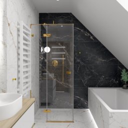 FIRMA REMONTOWA FINISZ SIKORA WIESŁAW - Nowoczesna łazienka na poddaszu z marmurowymi płytkami, kabiną prysznicową ze złotymi detalami i owalną umywalką.