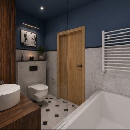 LISSE STUDIO PAWEŁ ŁYSKAWIŃSKI - Nowoczesna łazienka z ciemnoniebieskimi ścianami, drewnianą szafką pod umywalką nablatową i podłogą w geometryczny wzór. Widoczna wanna, podwieszana toaleta i biały grzejnik drabinkowy.
