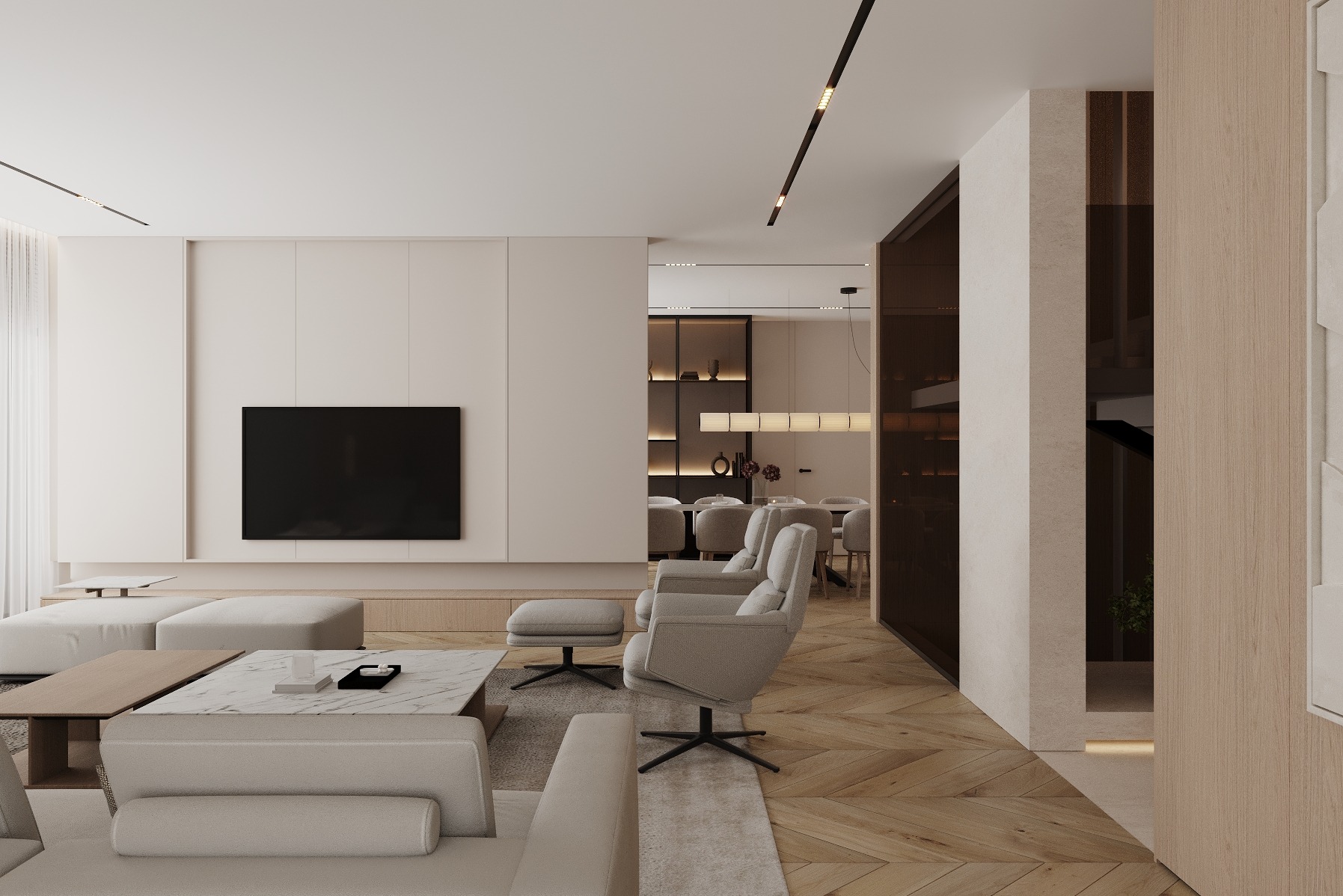 Elegancki salon z telewizorem na ścianie, beżowe meble, drewniana podłoga i widok na jadalnię. Minimalistyczny design z akcentami światła.