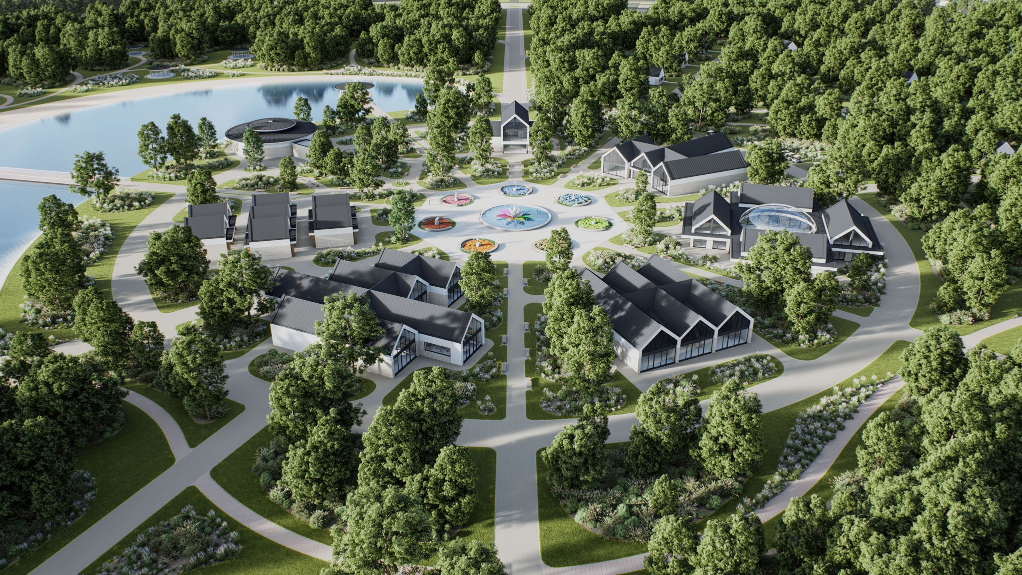 Wizualizacja osiedla domów jednorodzinnych z lotu ptaka, otoczonego zielenią i jeziorem. Centralny punkt stanowi fontanna z kolorowymi elementami.