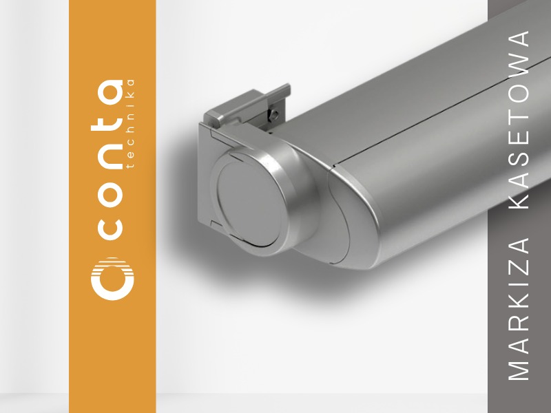 Szczegółowe ujęcie kasety markizy w srebrnym odcieniu, z widocznym mocowaniem. Minimalistyczny design i gładka powierzchnia. Logo producenta widoczne z boku.