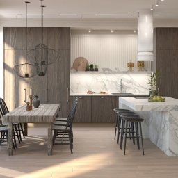 ZMYSŁ WNĘTRZA Architektura Roksana Simińska - Nowoczesna kuchnia z wyspą i jadalnią w odcieniach szarości i bieli. Marmurowy blat, drewniane szafki, designerskie lampy wiszące. Duże okno z zasłonami.