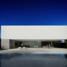 ICON STUDIO ALEKSANDER PAWLUS - Nowoczesna bryła domu z dużymi przeszkleniami w Węgierskiej Górce, widok od strony basenu. Minimalistyczny design, jasna elewacja, ciemne niebo.