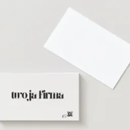Minimalistyczna wizytówka z napisem 'twoja firma' i subtelnym kodem QR. Białe tło, elegancki font, prosta kompozycja. Prezentacja wizytówki.