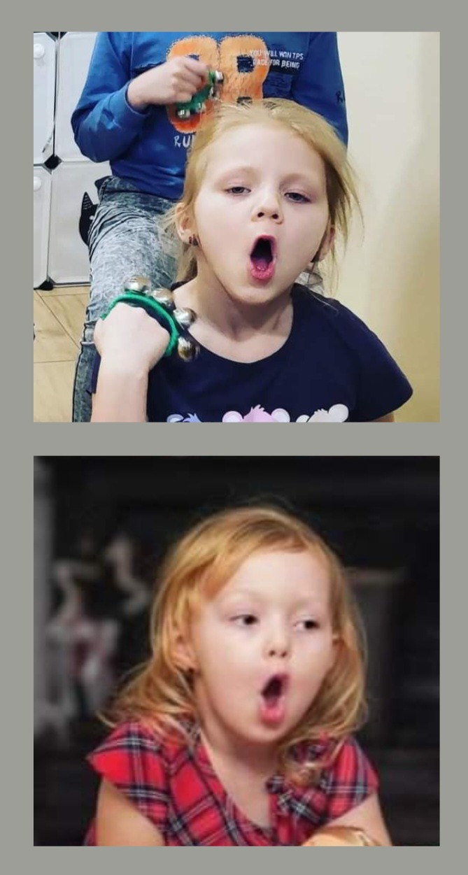 Dwie dziewczynki śpiewają, jedna z tamburynem na ręce, druga w czerwonej koszuli w kratę. Nauka śpiewu i gry na instrumentach dla dzieci.