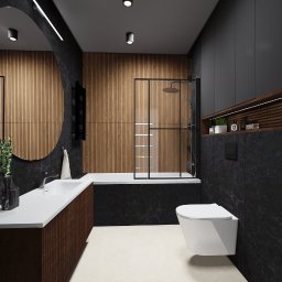 Details Studio - Nowoczesna łazienka z drewnianymi lamelami, czarnym marmurem i minimalistyczną armaturą. Okrągłe lustro z podświetleniem LED i kabina prysznicowa typu walk-in.