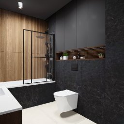 Details Studio - Nowoczesna łazienka z drewnianą ścianą, czarnymi płytkami imitującymi marmur i minimalistyczną kabiną prysznicową. Uwagę zwraca podświetlana półka z dekoracjami.