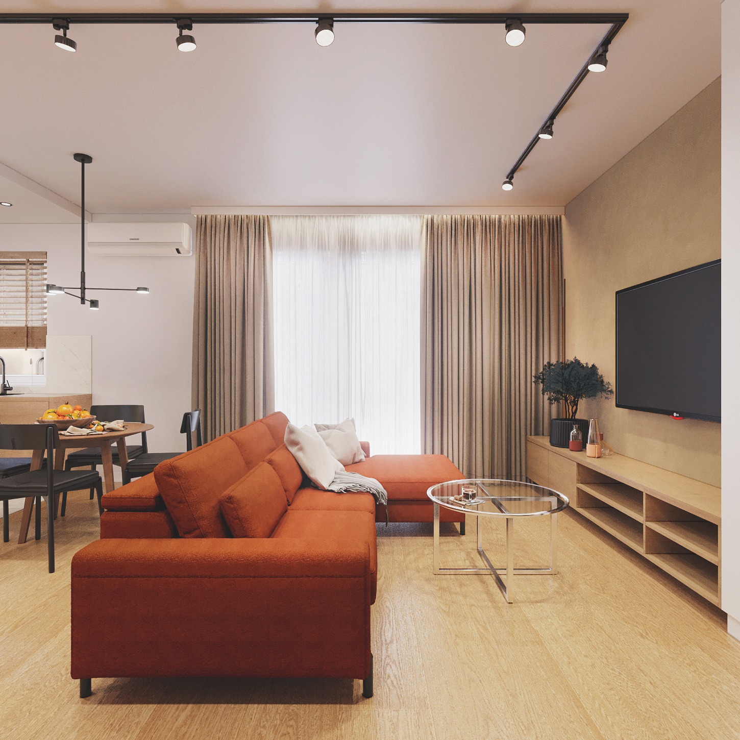 Nowoczesny salon z pomarańczową sofą narożną, okrągłym szklanym stolikiem i drewnianą podłogą. Oświetlenie szynowe i telewizor na ścianie. Minimalistyczny wystrój.