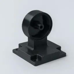 Czarny, matowy element z tworzywa sztucznego, prawdopodobnie wydrukowany w 3D. Widoczne warstwy druku, okrągły element na podstawie z otworami montażowymi.