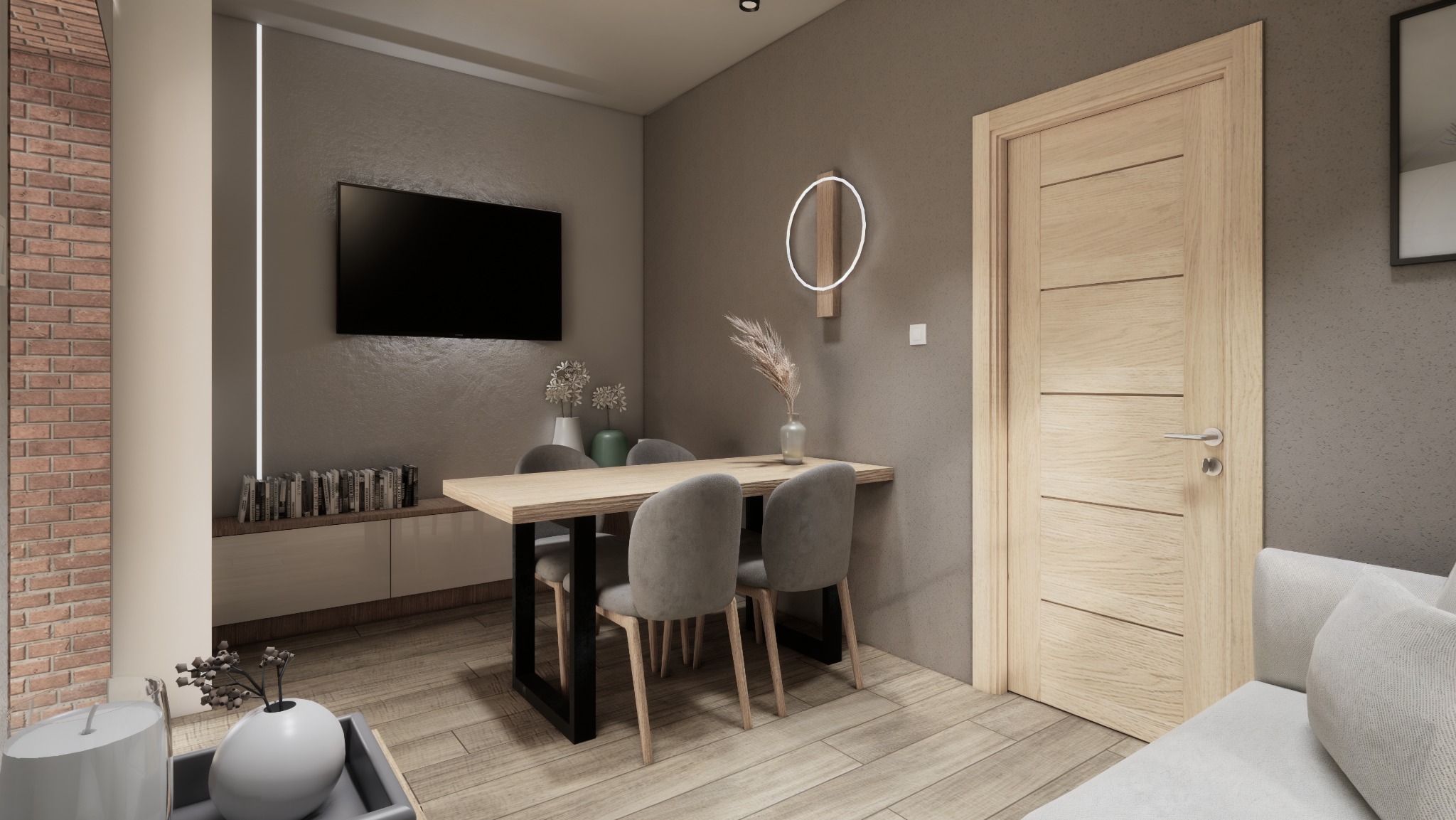 Nowoczesna jadalnia z drewnianym stołem i szarymi krzesłami. Na ścianie telewizor i okrągła lampa. Minimalistyczny design, ciepłe oświetlenie, parkiet na podłodze.