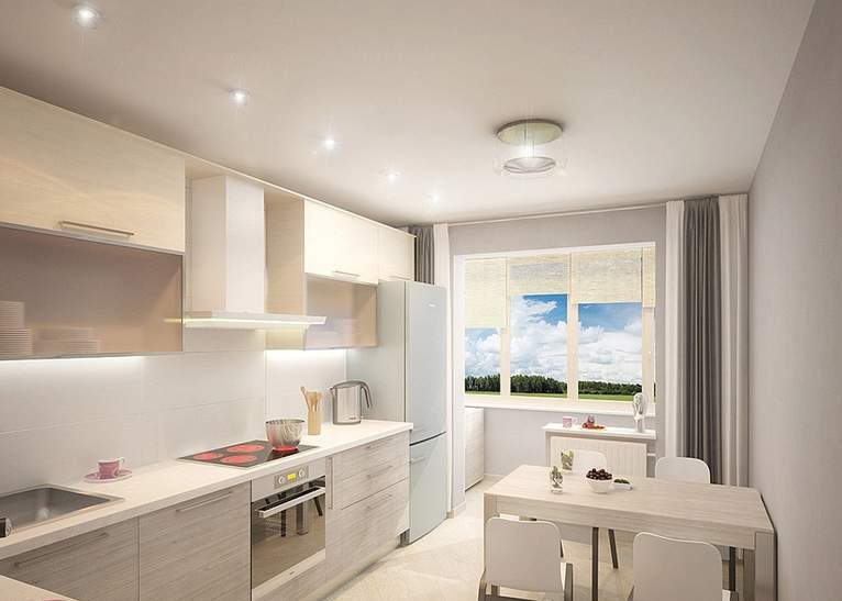 Jasna kuchnia z drewnianymi szafkami, białymi ścianami i oknem z widokiem na niebo. Na suficie widoczne punktowe oświetlenie. Minimalistyczny design.