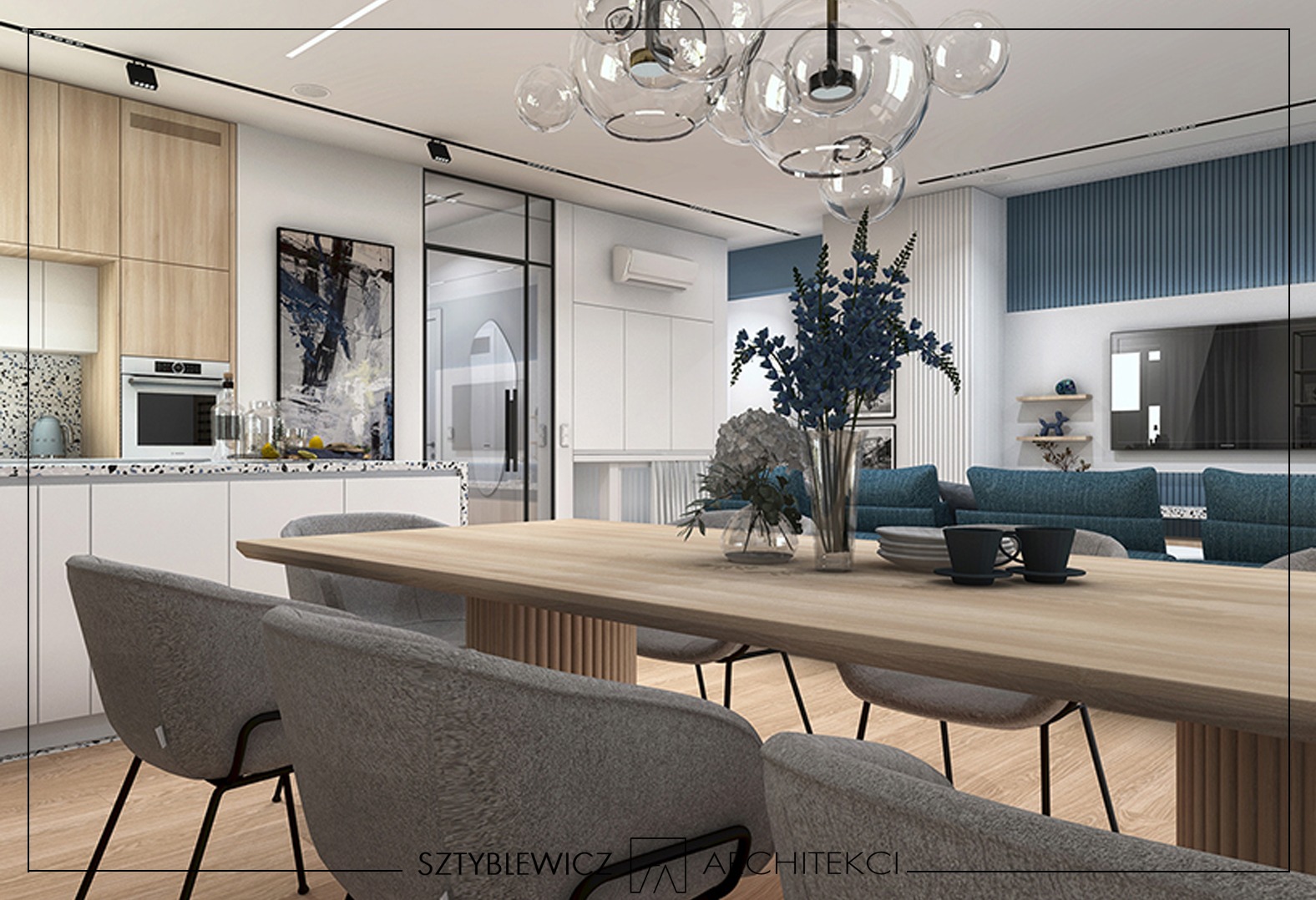 Nowoczesne wnętrze: jadalnia z drewnianym stołem, szarymi krzesłami i dekoracyjnymi elementami, w tle kuchnia i salon w odcieniach bieli i błękitu. Całość doświetlona lampą.