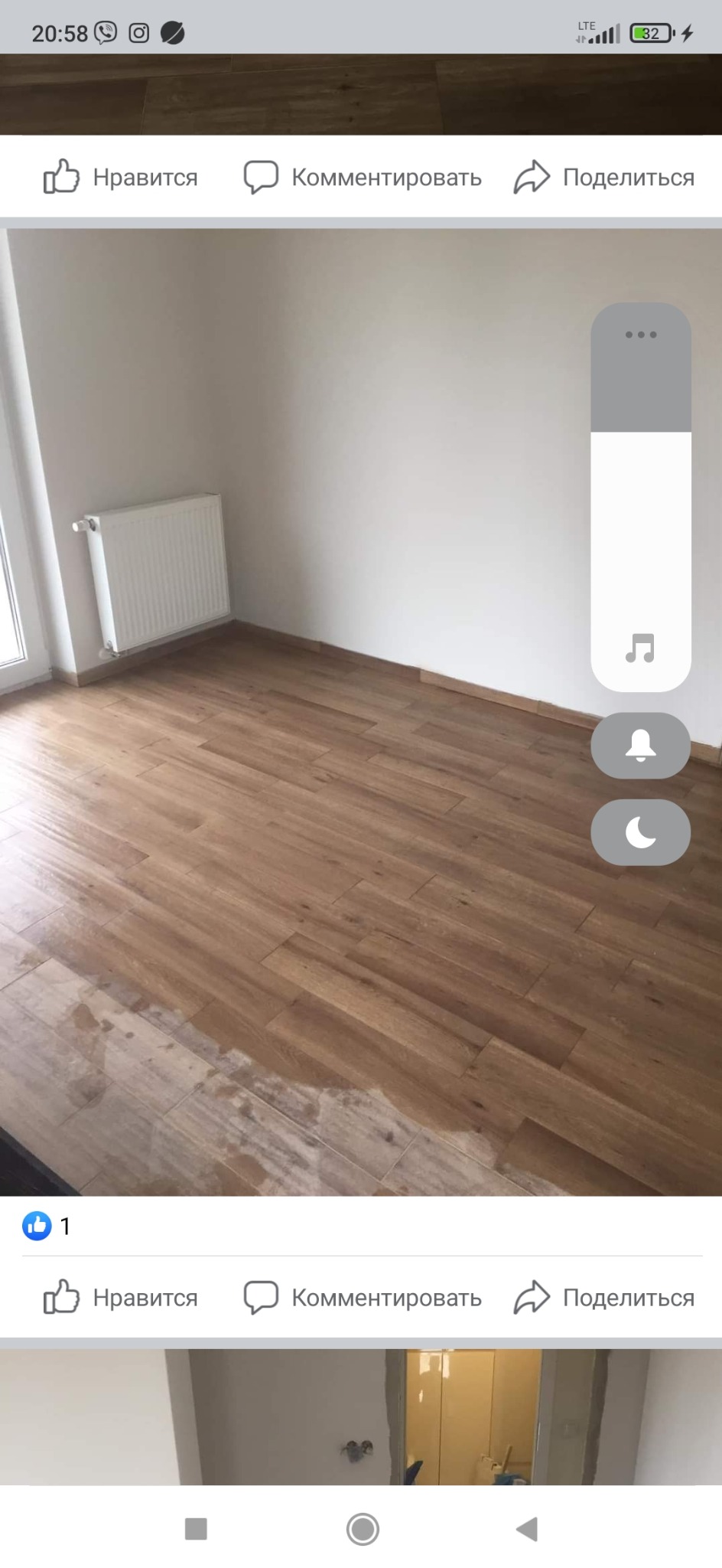 Ułożona podłoga z paneli imitujących drewno w pustym pokoju z grzejnikiem. Widoczne niedociągnięcia w ułożeniu paneli. Świeżo wykończone wnętrze.