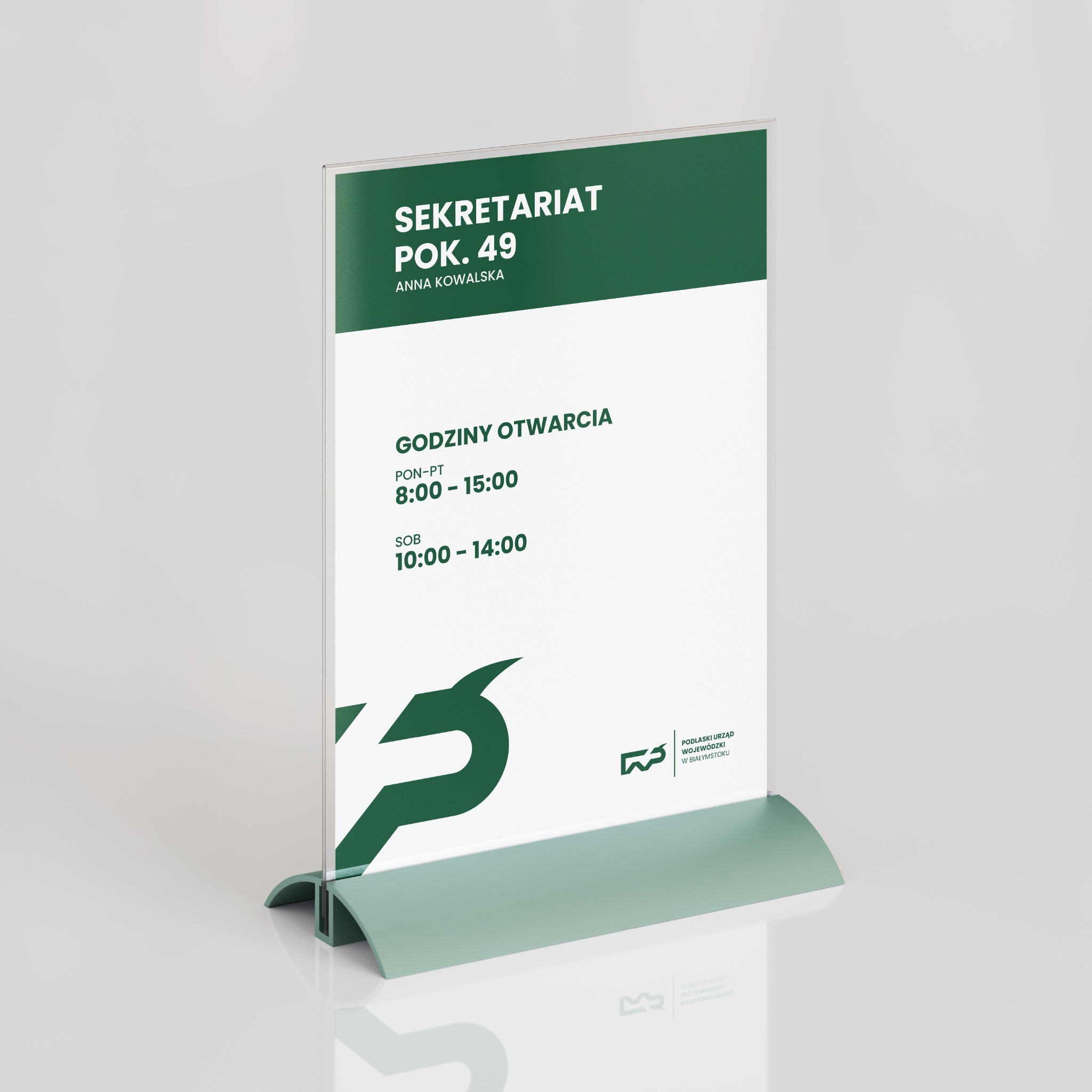 Stojak z informacją o sekretariacie, godzinach otwarcia i logo Podlaskiego Urzędu Wojewódzkiego w Białymstoku. Zastosowano zieleń i biel.