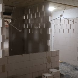 Usługi ogólnobudowlane Łukasz Sosnowski - Odbudowa ścian ażurowych w komórkach lokatorskich w budynku wielorodzinnym